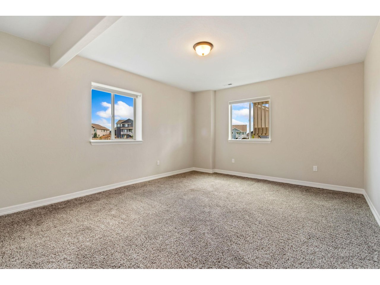 5531 Teeling Court Timnath, CO 80547 - Photo 35 of 48 a view of empty room with windows