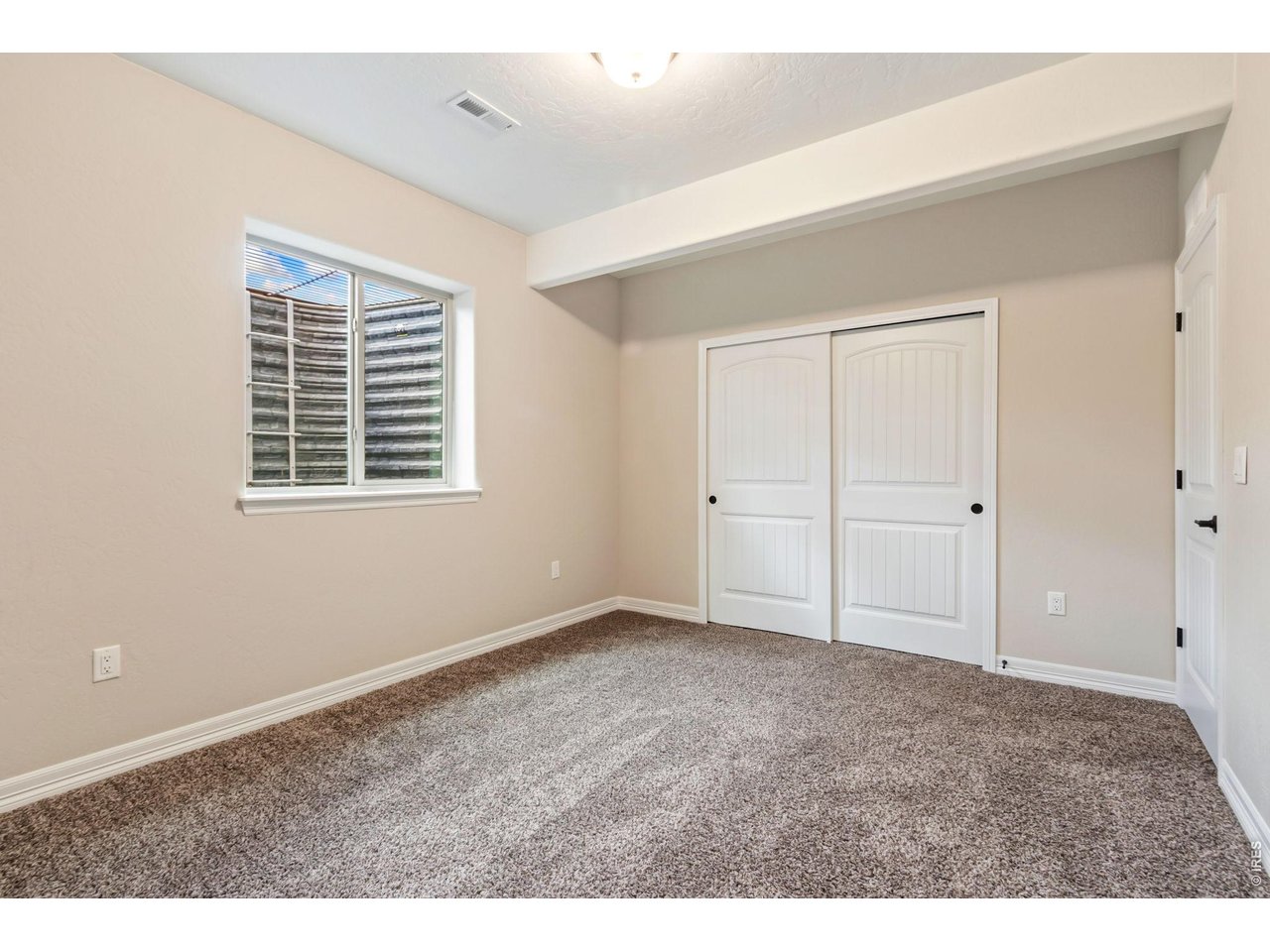 5531 Teeling Court Timnath, CO 80547 - Photo 36 of 48 a view of an empty room with a window