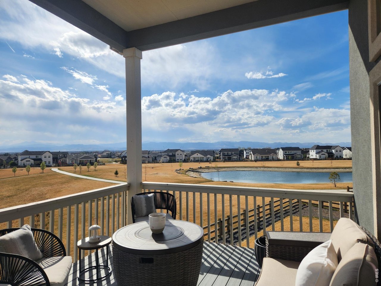 5531 Teeling Court Timnath, CO 80547 - Photo 10 of 48 a view of a balcony with wooden floor