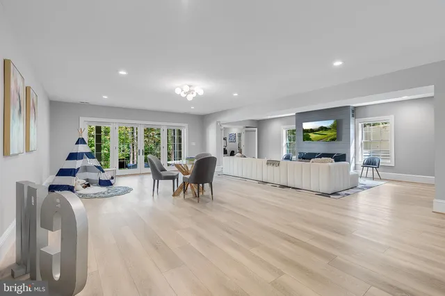 a living room with furniture and a table