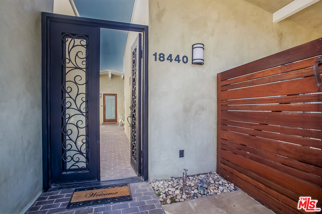 18440 Coastline Drive Malibu, CA 90265 - Photo 3 of 21 a view of an entryway with wooden floor