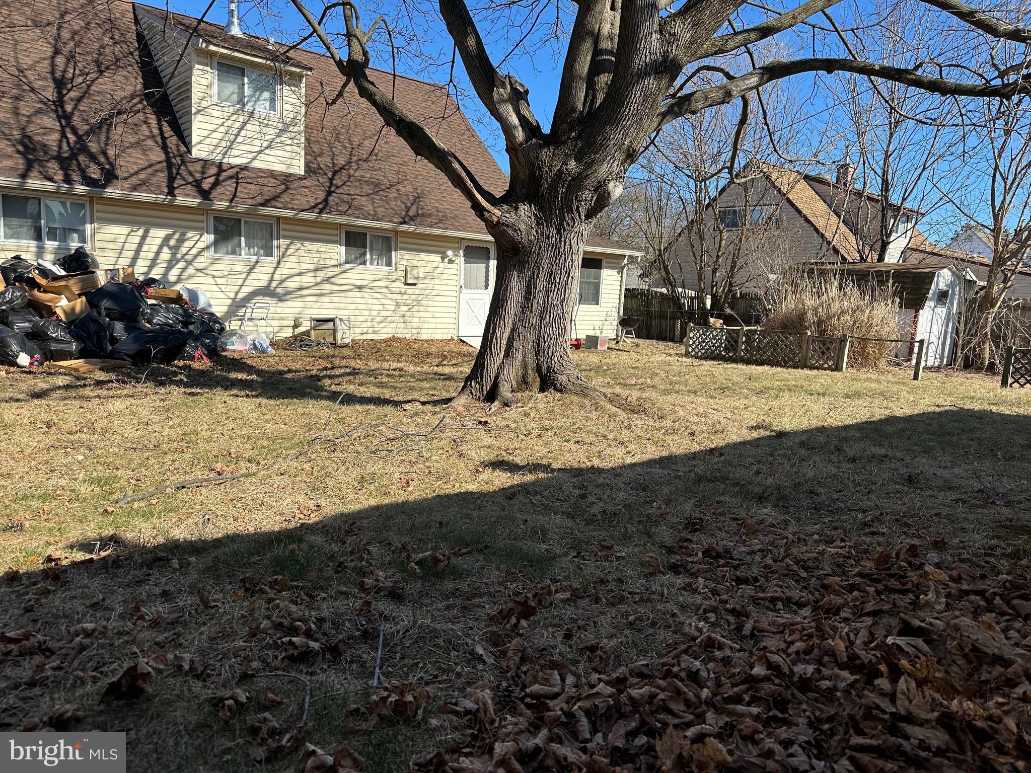 71 Handy Road Levittown, PA 19056 - Photo 2 of 2 a view of a house with a snow in the yard