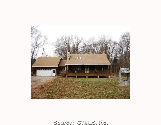 264 Briar Hill Road Groton, CT 06340 - Photo 1 of 1 a view of a house with a yard