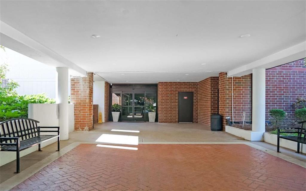 375 Ralph McGill Boulevard Northeast, Unit 108 Atlanta, GA 30312 - Photo 10 of 13 a view of a room with stairs and furniture