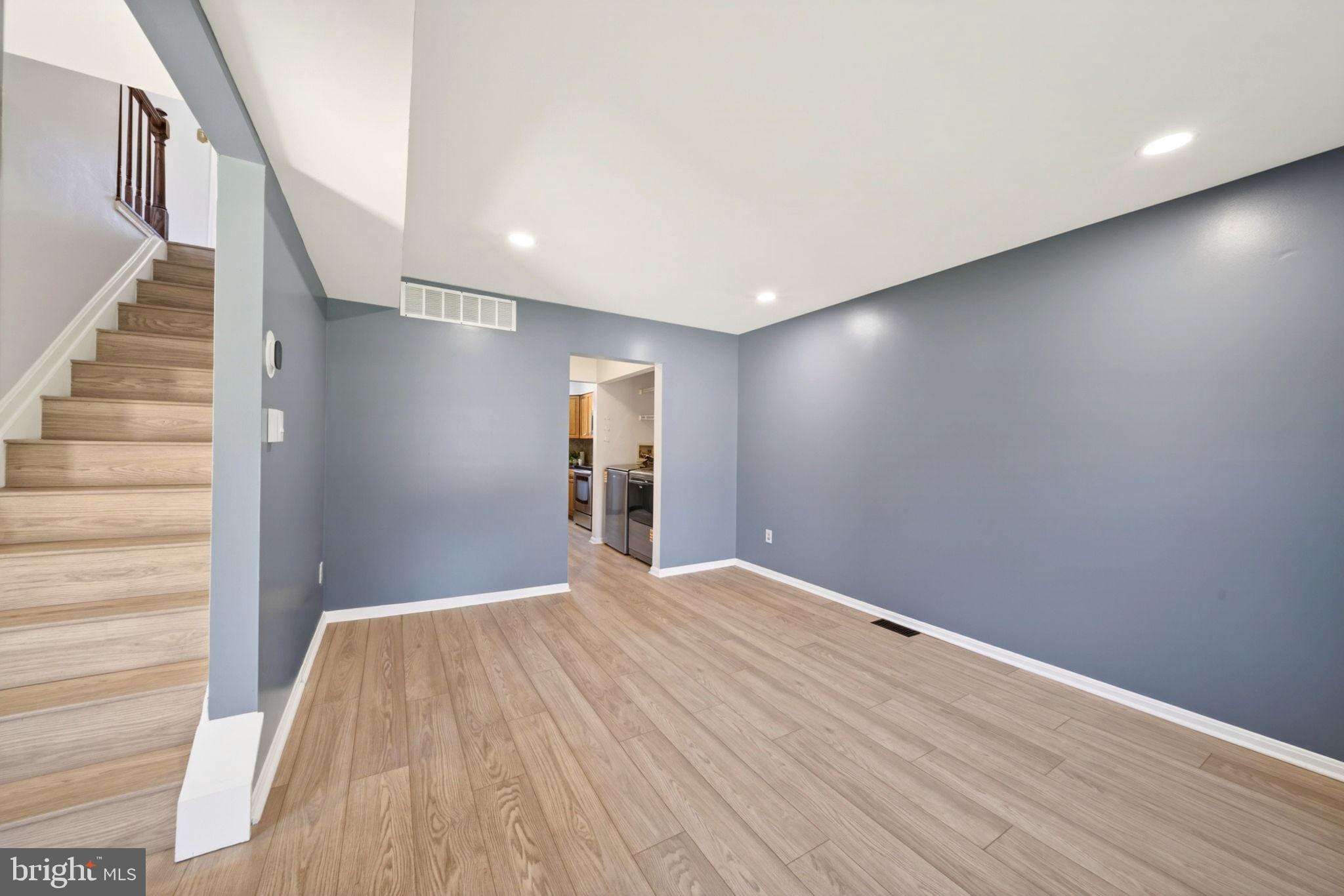 9331 Oak White Road Nottingham, MD 21236 - Photo 15 of 34 a view of empty room with wooden floor and fan