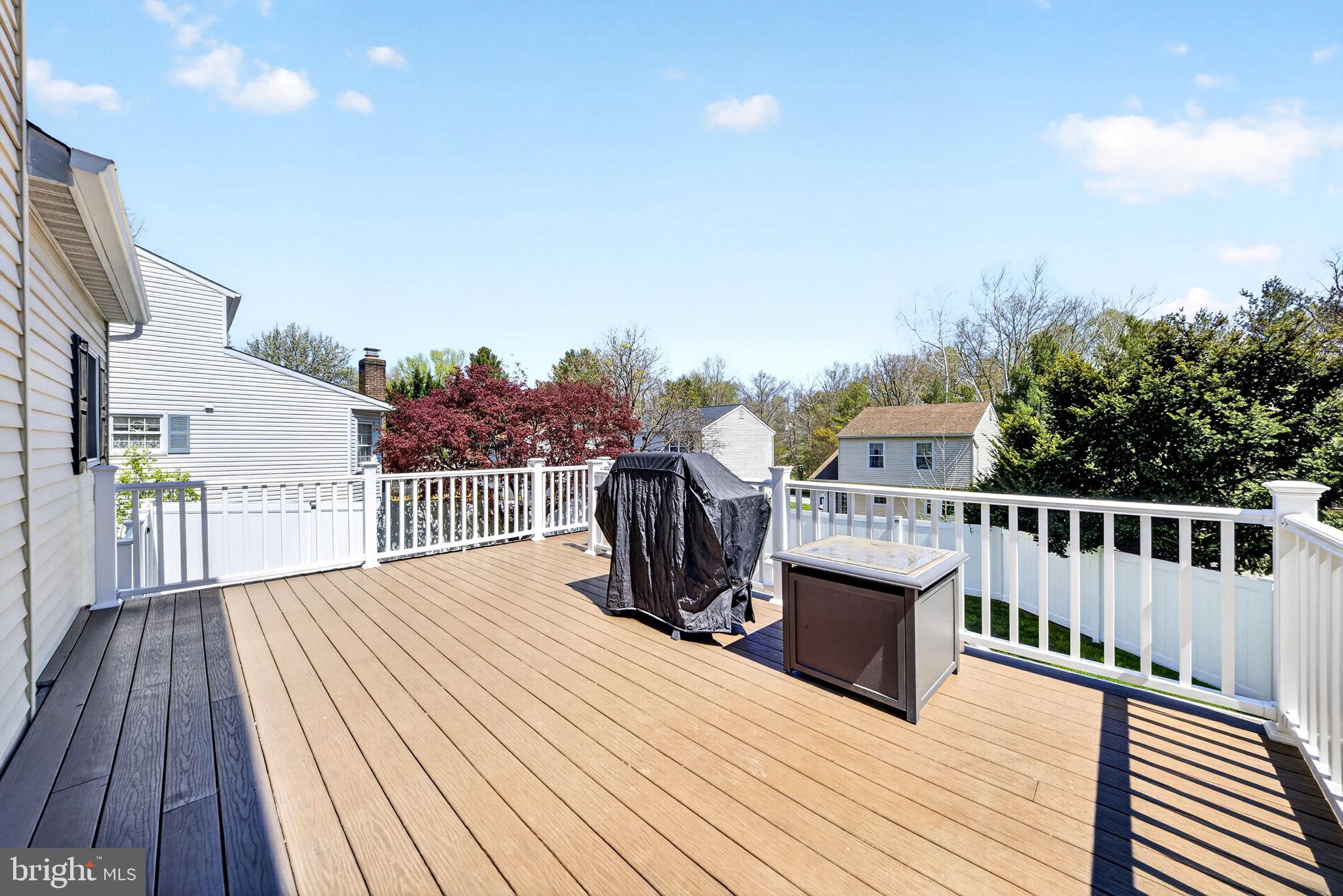 9331 Oak White Road Nottingham, MD 21236 - Photo 6 of 34 a view of balcony with deck and wooden floor
