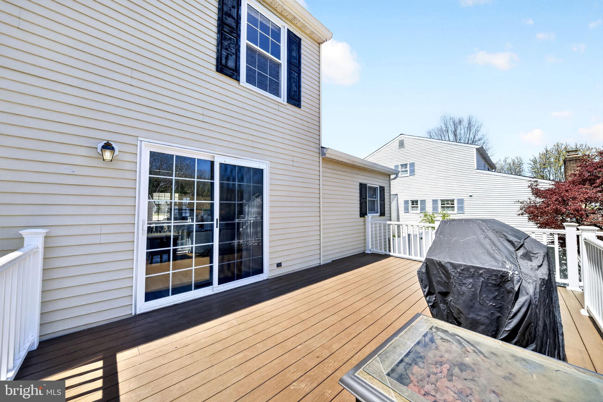 9331 Oak White Road Nottingham, MD 21236 - Photo 7 of 34 a view of a house with a large window and wooden fence