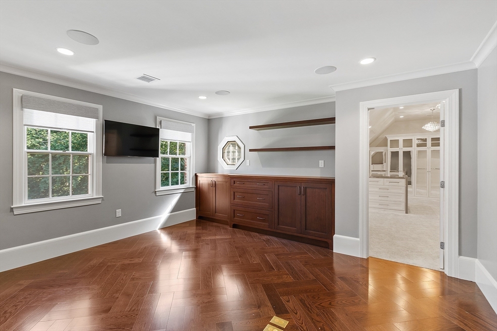 40 Grandview Road Chelmsford, MA 01824 - Photo 24 of 42 a view of empty room with wooden floor and fan