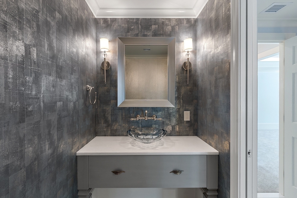 40 Grandview Road Chelmsford, MA 01824 - Photo 28 of 42 a bathroom with a sink and a mirror