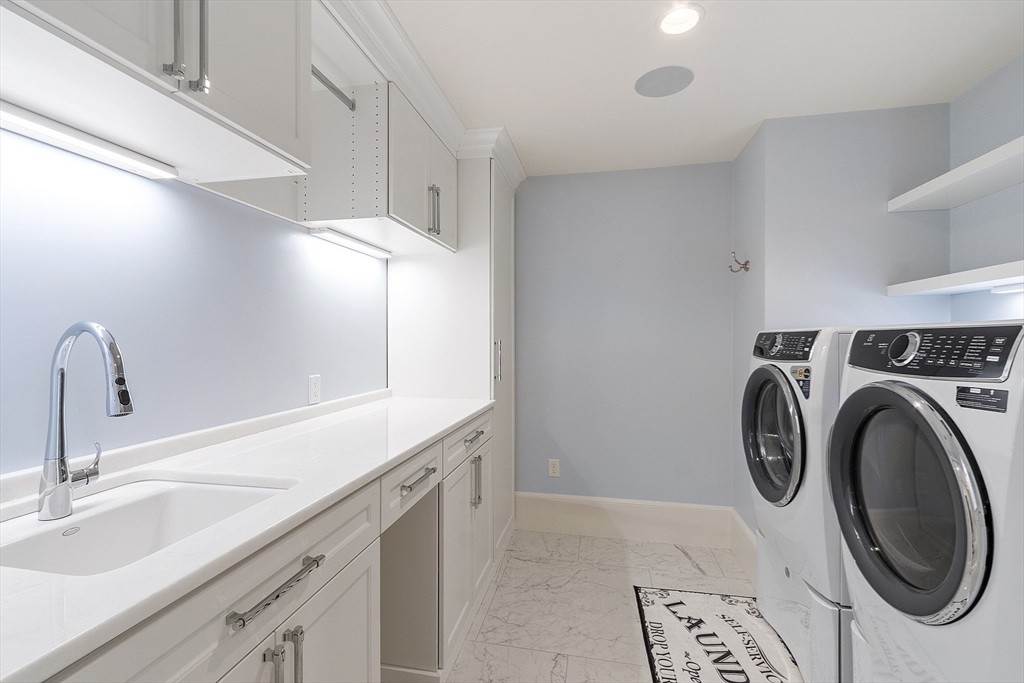 40 Grandview Road Chelmsford, MA 01824 - Photo 29 of 42 a utility room with sink dryer and washer