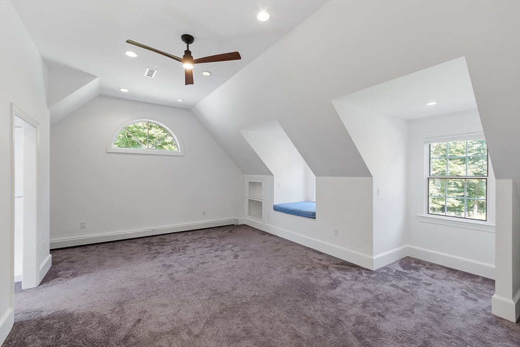 40 Grandview Road Chelmsford, MA 01824 - Photo 31 of 42 an empty room with ceiling fan and window