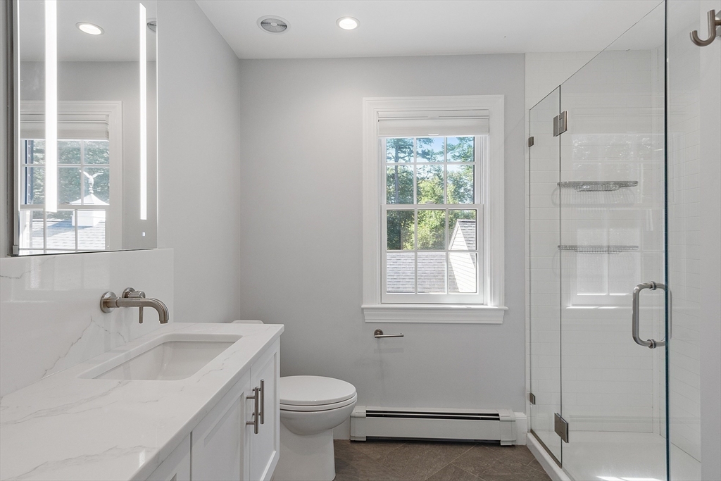 40 Grandview Road Chelmsford, MA 01824 - Photo 35 of 42 a bathroom with a sink toilet and shower
