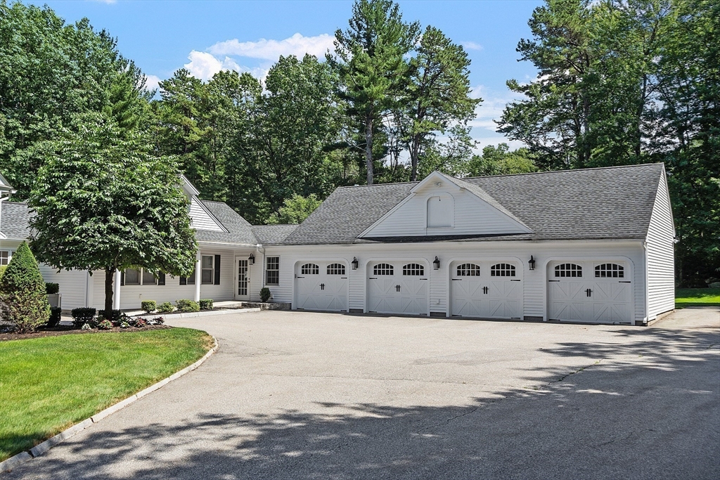 40 Grandview Road Chelmsford, MA 01824 - Photo 41 of 42 front view of a house with a yard