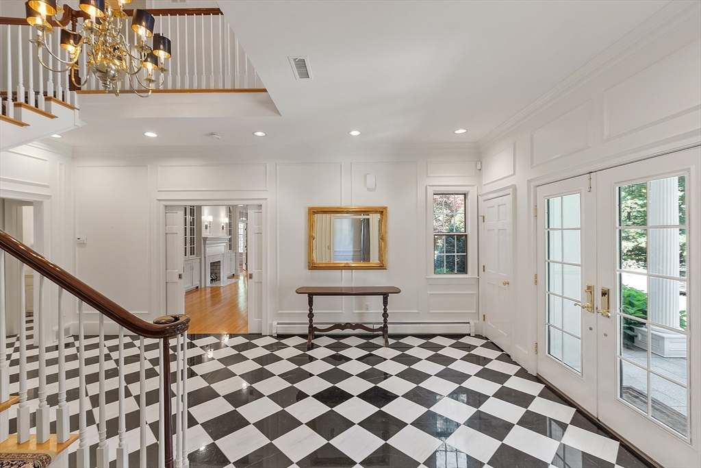 40 Grandview Road Chelmsford, MA 01824 - Photo 6 of 42 a view of a hallway with windows and chairs