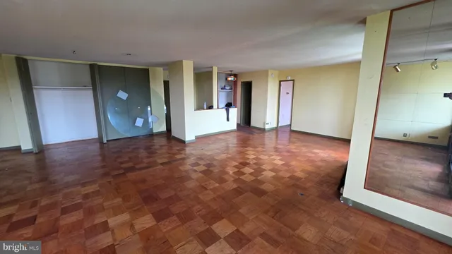 a kitchen with a sink a stove and cabinets