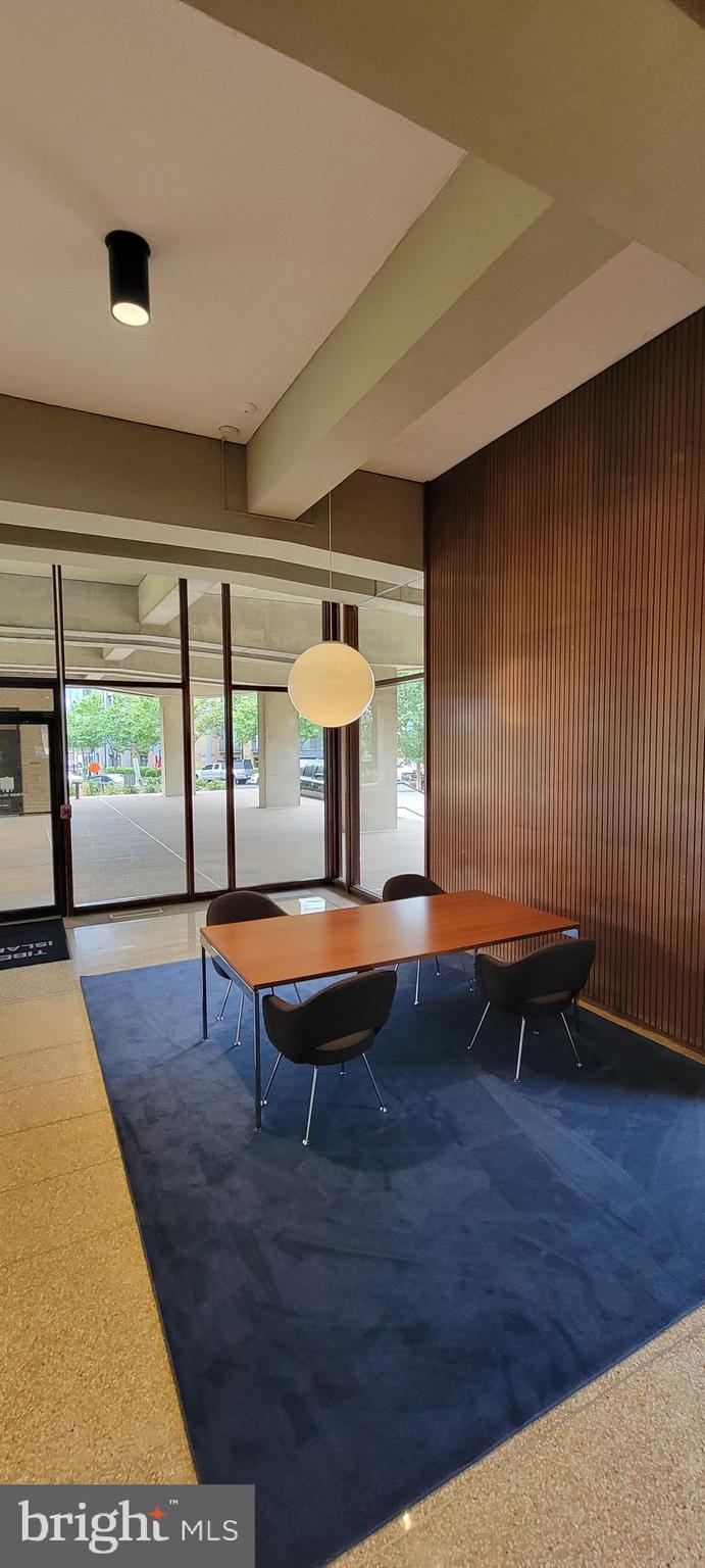 490 M Street Southwest, Unit W705 & 709 Washington, DC 20024 - Photo 7 of 37 a room with pool table and windows