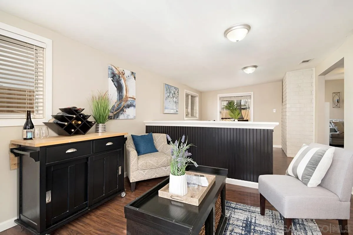 14112 Frame Road Poway, CA 92064 - Photo 16 of 30 a living room with furniture and a potted plant