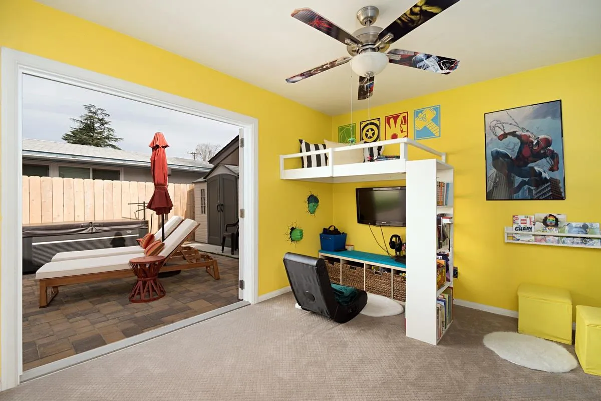 14112 Frame Road Poway, CA 92064 - Photo 20 of 30 a view of a livingroom with furniture and a ceiling fan