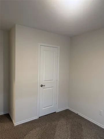 a bathroom with a toilet a sink and bathtub