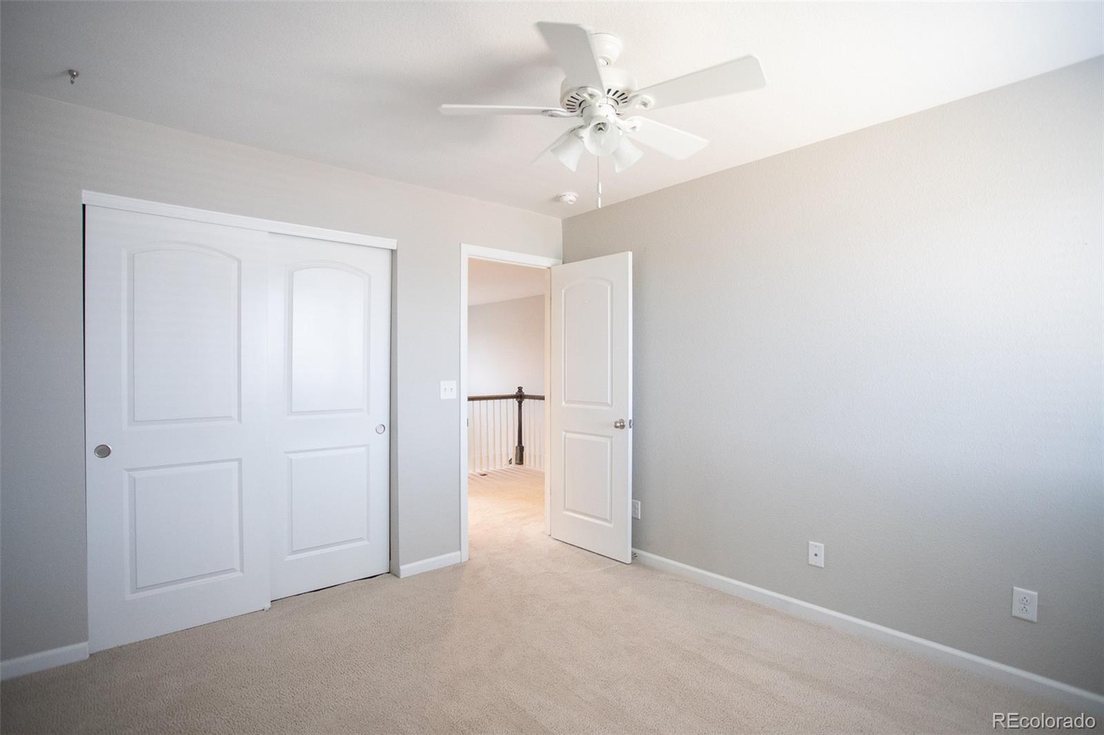 16343 East 100th Way Commerce City, CO 80022 - Photo 31 of 38 a view of an empty room