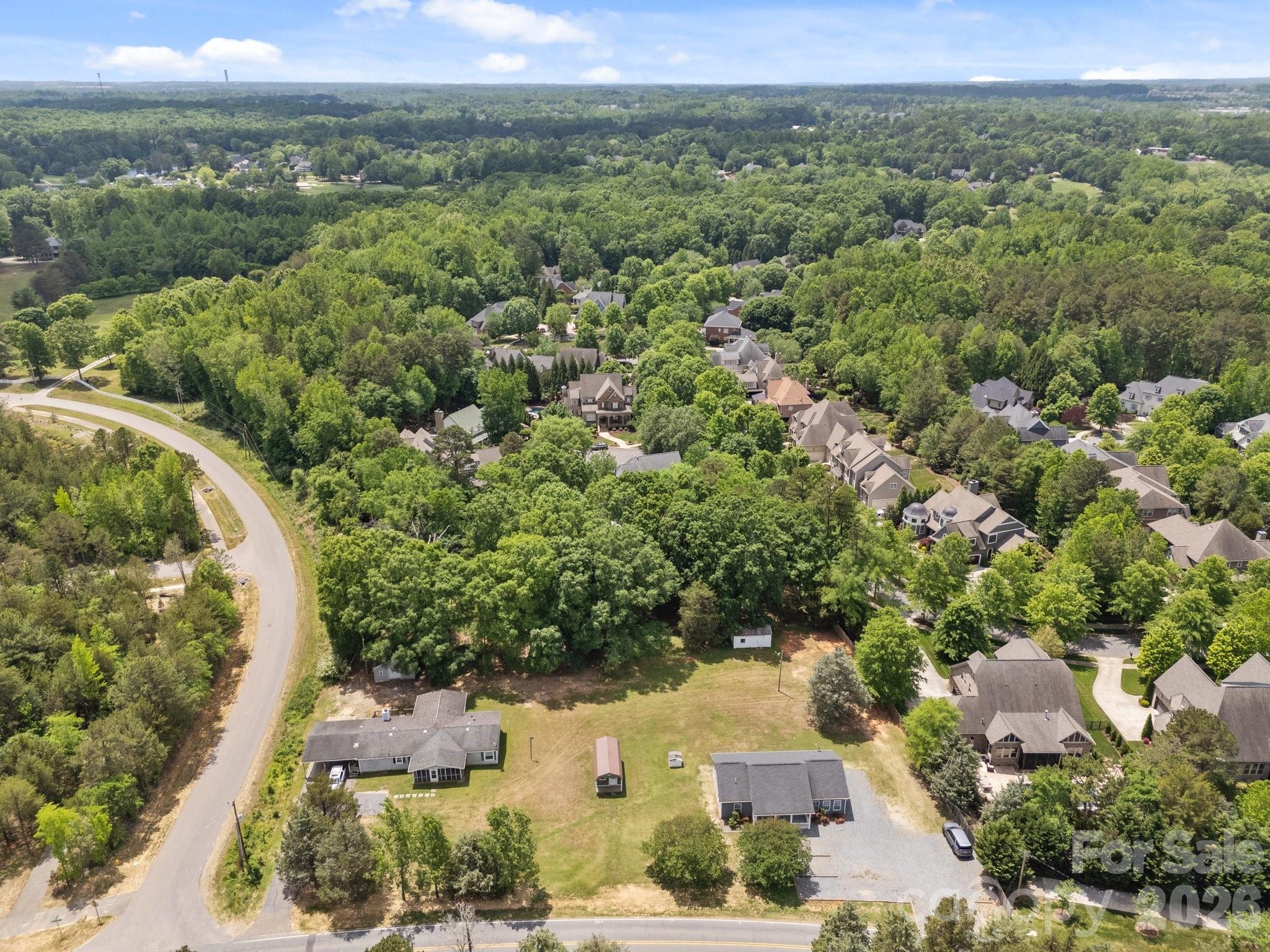 14532 East Rocky River Road Davidson, NC 28036 - Photo 32 of 32 an aerial view of a house with a yard