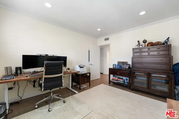 a view of a workspace with furniture