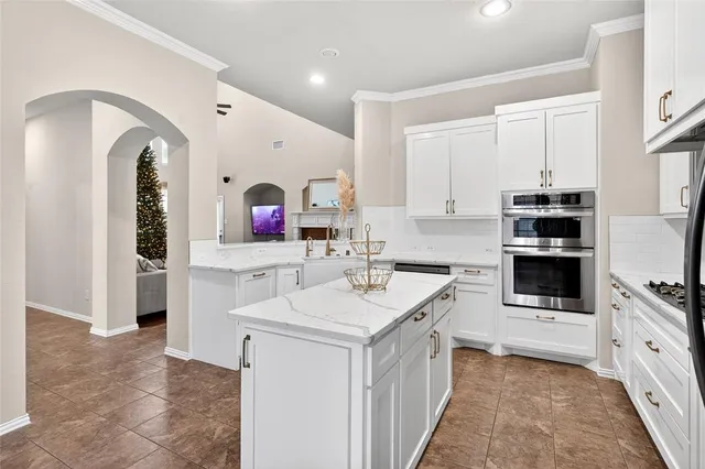 a room with furniture and a chair