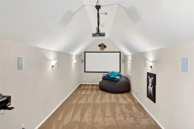 a en suite bathroom with a sink and mirror