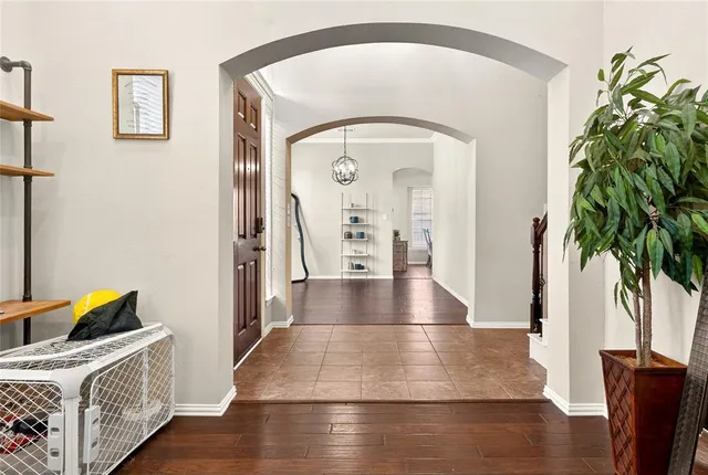a living room with furniture fireplace and window
