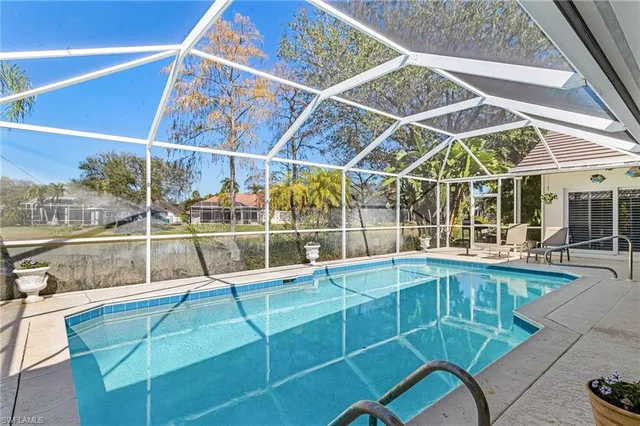 a view of a house with a swimming pool
