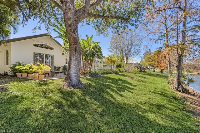 a backyard of a house with lots of green space