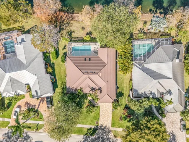 an aerial view of a house with outdoor space