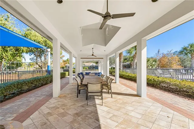 a view of a dining room with furniture wooden floor and garden