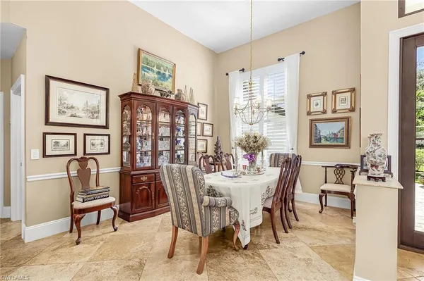 a view of a dining room with furniture