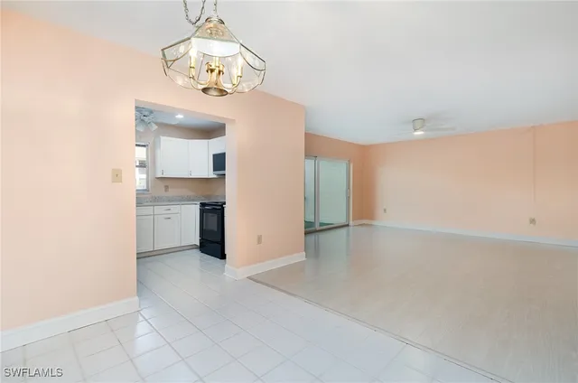 a view of a kitchen with a sink