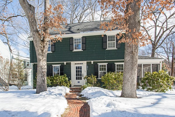 38 Dwhinda Road Newton, MA 02468 - Photo 1 of 30 a view of a brick house with a large windows and a large tree
