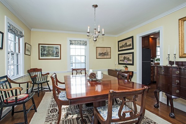 38 Dwhinda Road Newton, MA 02468 - Photo 13 of 30 a view of a dining room with furniture and chandelier