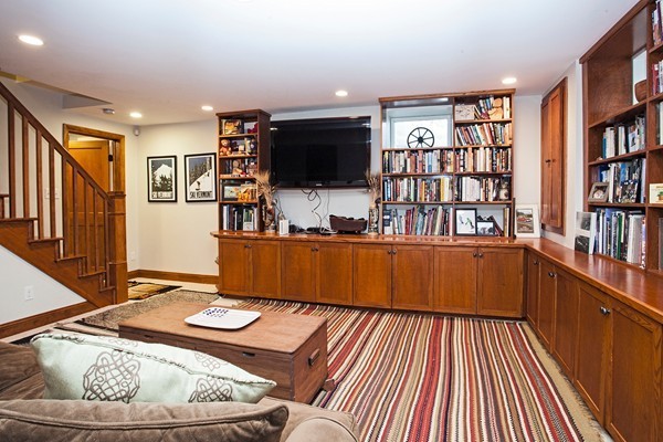 38 Dwhinda Road Newton, MA 02468 - Photo 4 of 30 a living room with furniture and a flat screen tv