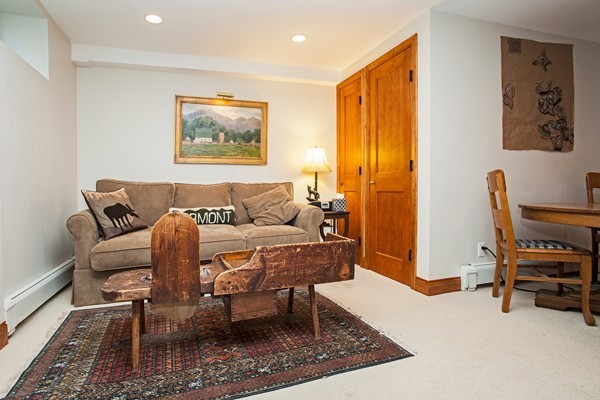 38 Dwhinda Road Newton, MA 02468 - Photo 5 of 30 a living room with furniture a piano and a window