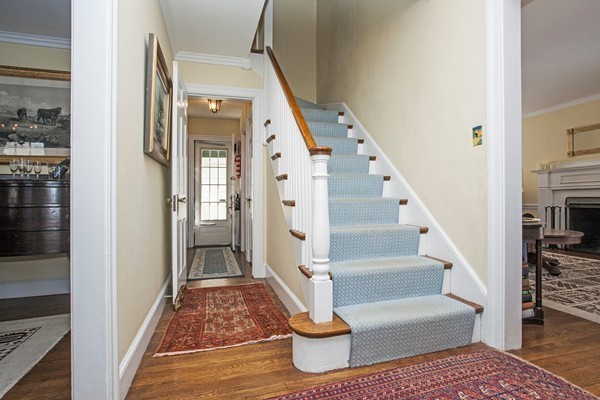 38 Dwhinda Road Newton, MA 02468 - Photo 7 of 30 a view of entryway and hall with wooden floor