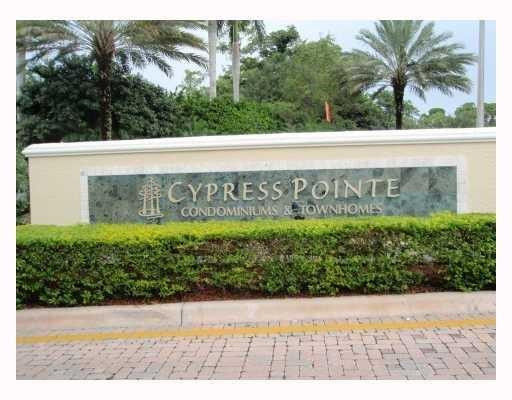 6702 West Sample Road, Unit 6702 Coral Springs, FL 33067 - Photo 1 of 8 a view of outdoor space with a garden