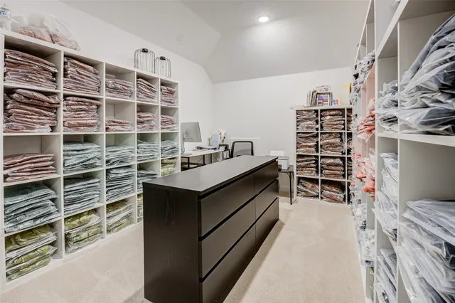 a kitchen with a cabinets and appliances