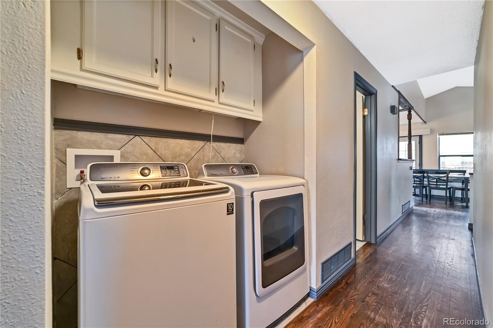 3796 South Ceylon Way Aurora, CO 80013 - Photo 7 of 16 a utility room with dryer and washer