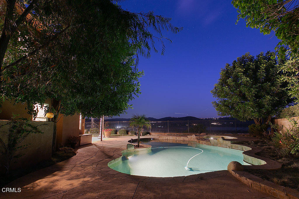 14216 Oneida Court Moorpark, CA 93021 - Photo 2 of 75 a swimming pool with outdoor seating and yard