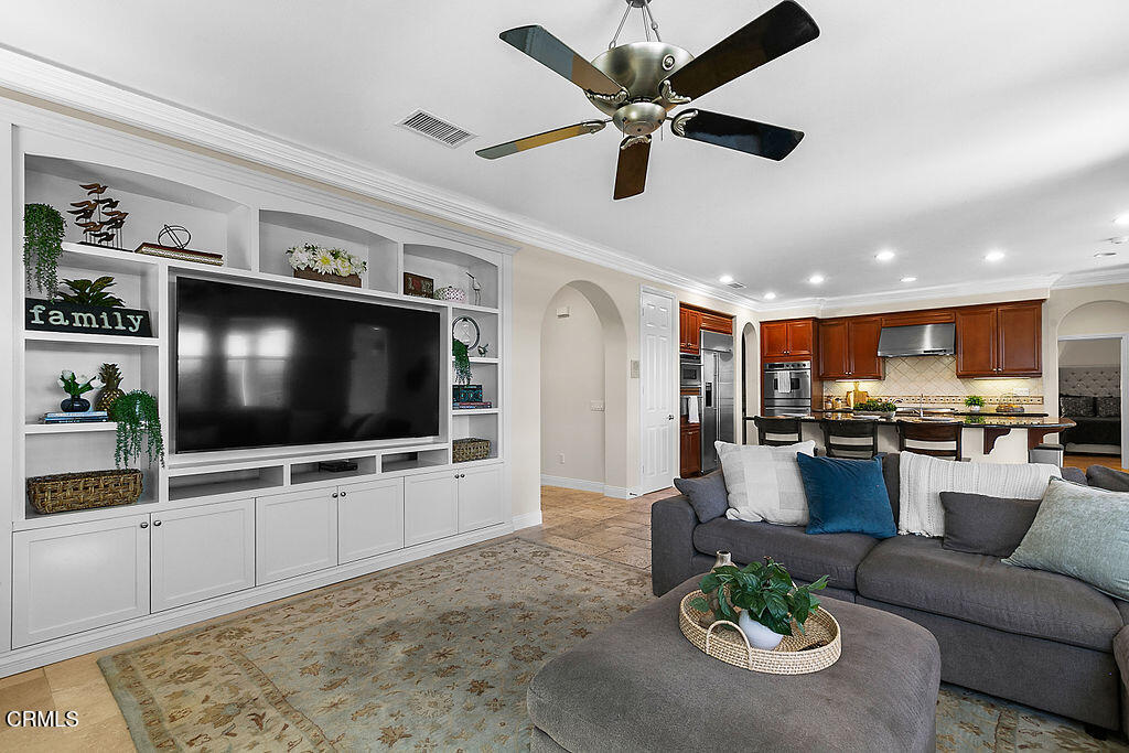 14216 Oneida Court Moorpark, CA 93021 - Photo 28 of 75 a living room with furniture and a flat screen tv