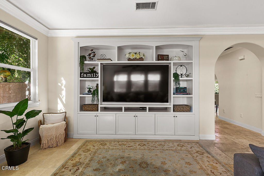 14216 Oneida Court Moorpark, CA 93021 - Photo 29 of 75 a living room with furniture and a flat screen tv