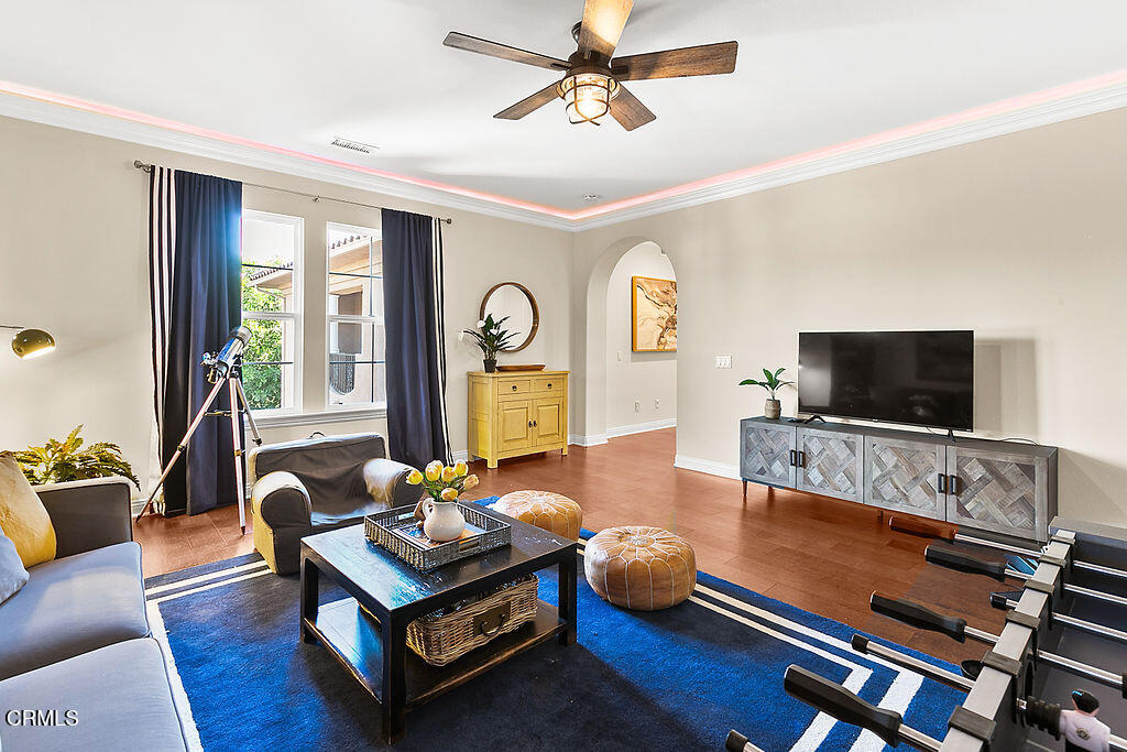 14216 Oneida Court Moorpark, CA 93021 - Photo 39 of 75 a living room with furniture flat screen tv and a window