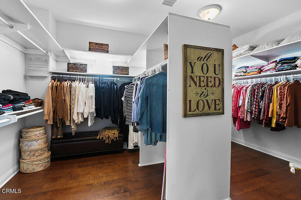 14216 Oneida Court Moorpark, CA 93021 - Photo 53 of 75 a view of walk in closet with clothes and shoes