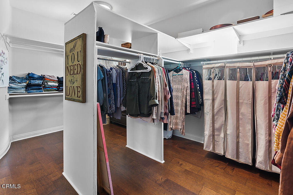 14216 Oneida Court Moorpark, CA 93021 - Photo 54 of 75 a view of walk in closet with clothes and shoes