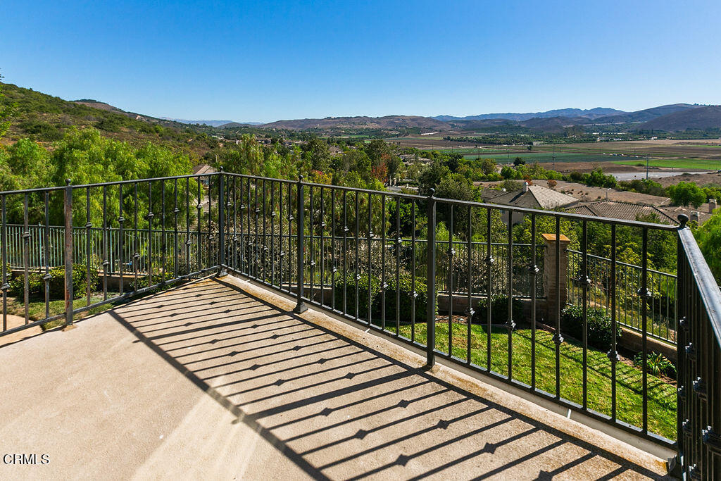 14216 Oneida Court Moorpark, CA 93021 - Photo 60 of 75 a view of a balcony with a floor to ceiling window